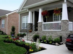 A-Beautiful-House-With-White-Stamped-Concrete-Walkways-For-Front-Yard-Hardscaping-Design-700x520