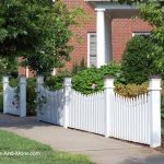 scalloped white picket fences