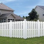 wooden lattice panel picket fence