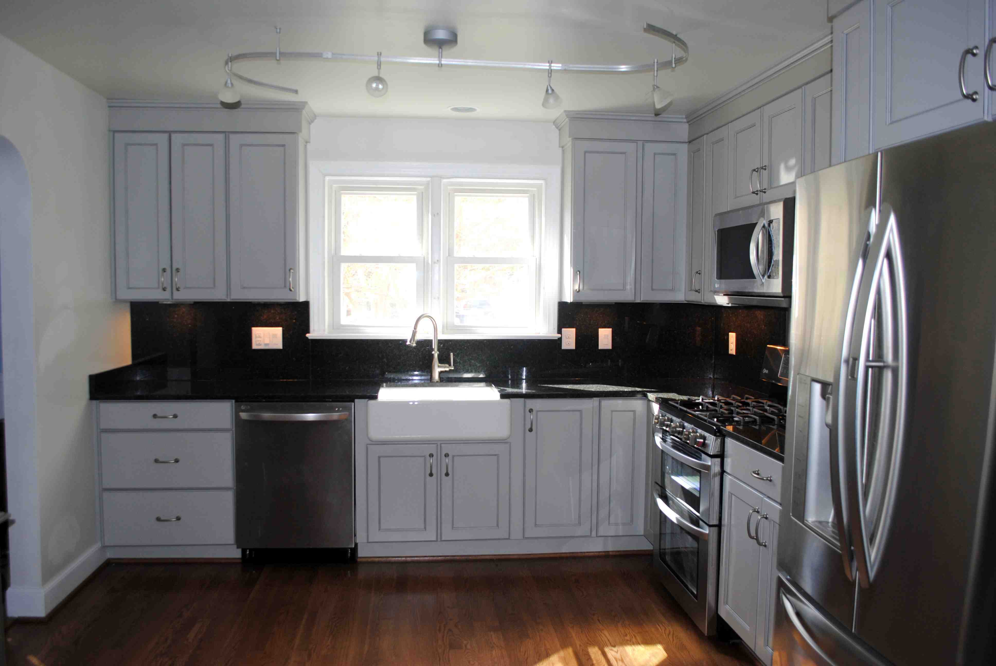 Rustic Kitchen Cabinets - Cozy kitchen area of a small private house